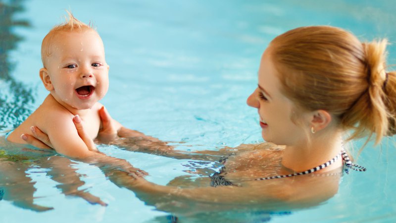 Baby/Toddler coming to mom in the water