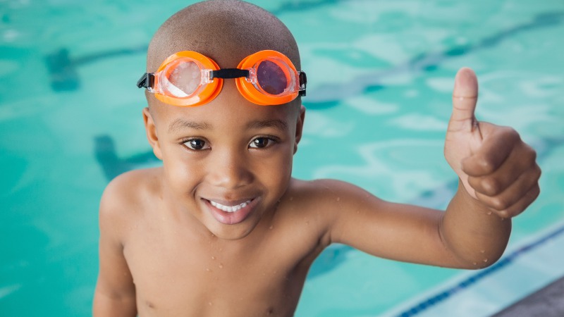 Child having fun at the pool